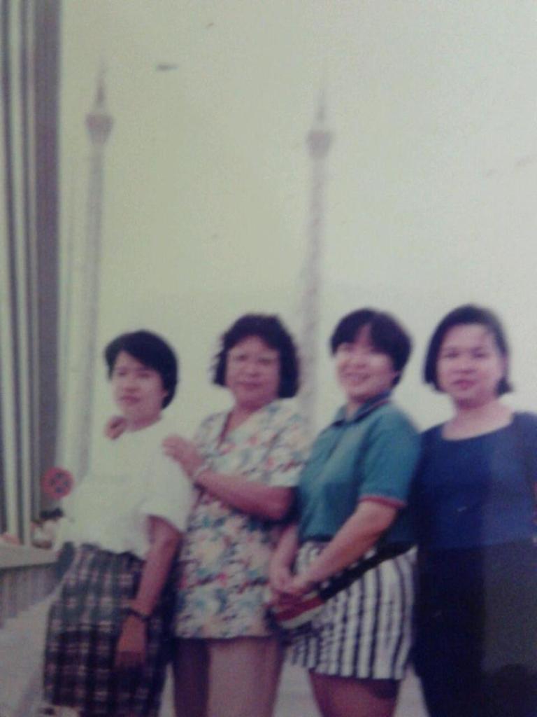 My Mama, a babysitter who was like a mother to me, and her 3 daughters. 